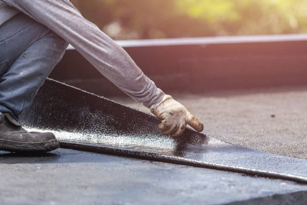 Professional Basement Waterproofing technician working in Gwynn Oak, MD